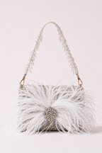 White feather handbag with crystal embellishments and dramatic couture-inspired texture