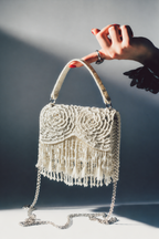 White festive occasion bag designed beautifully for receptions and cocktail dressing
