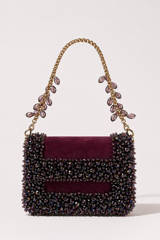 Wine pink designer handbag with sparkling embellishments and elegant chain detailing