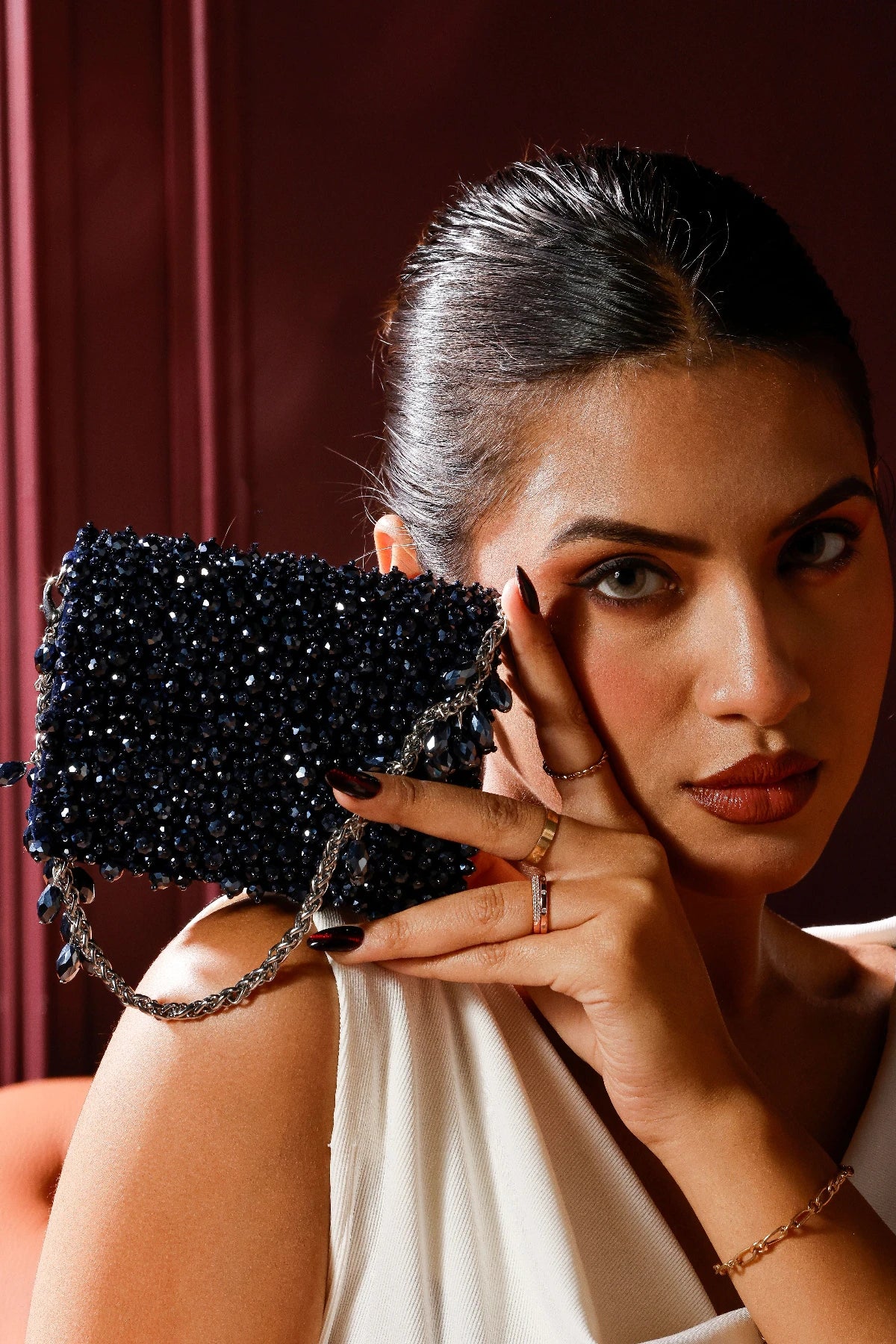 Luxury charcoal blue shoulder bag for glamorous celebrations