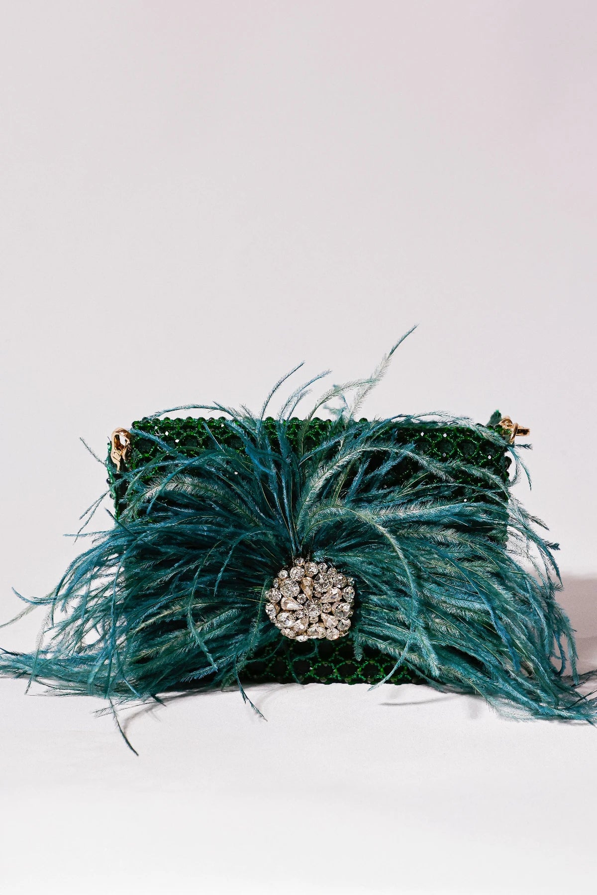 Luxury cocktail party bag with elegant feather detailing