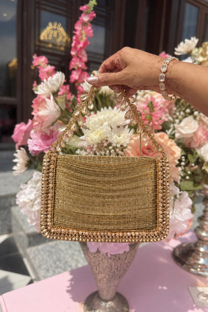 Luxury golden shoulder bag for wedding celebrations