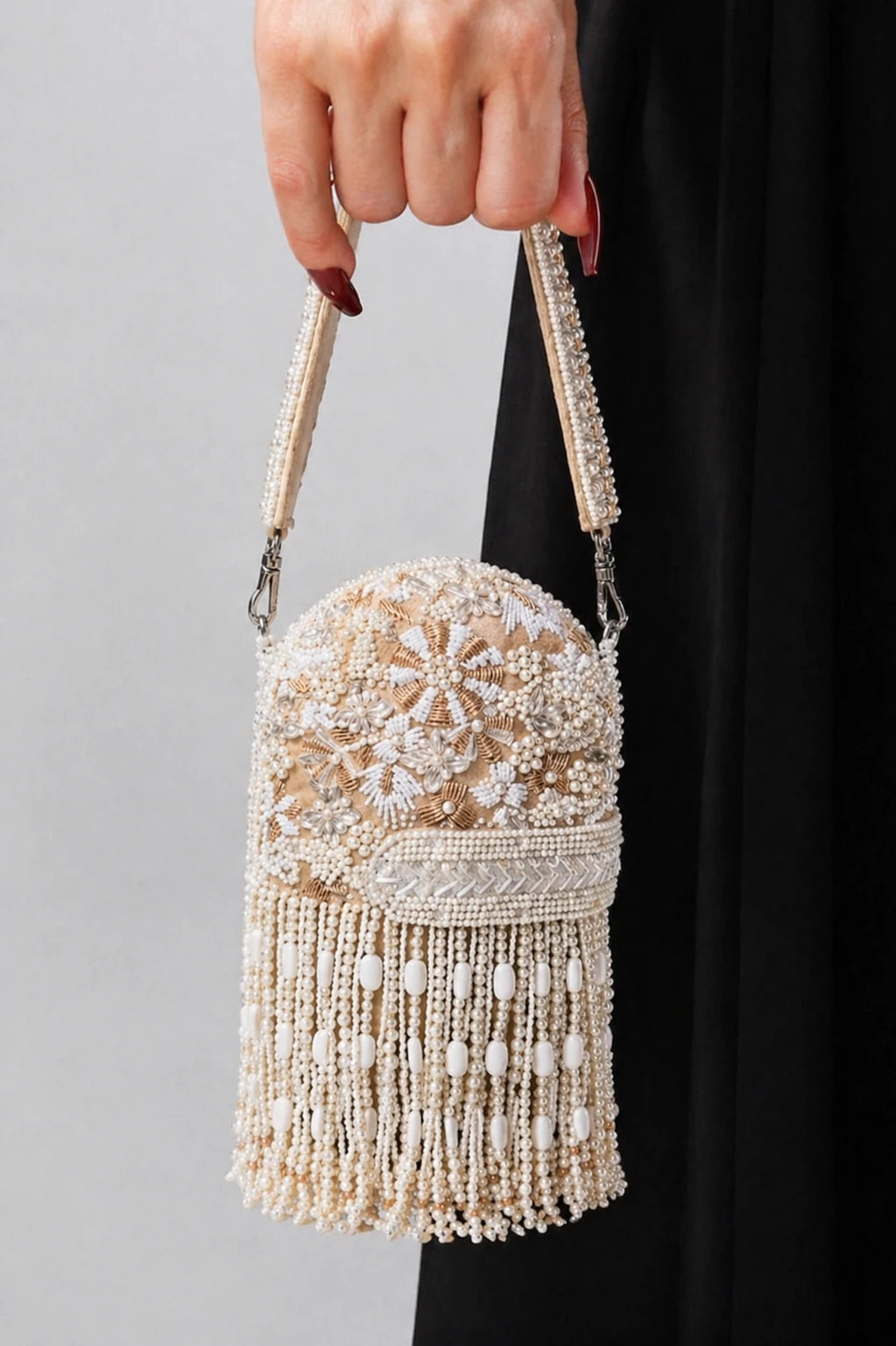 Luxury ivory clutch bag for cocktail evenings and celebrations
