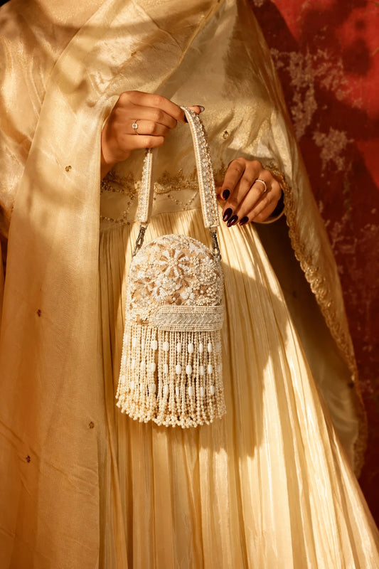 Luxury ivory clutch bag for cocktail evenings and celebrations

