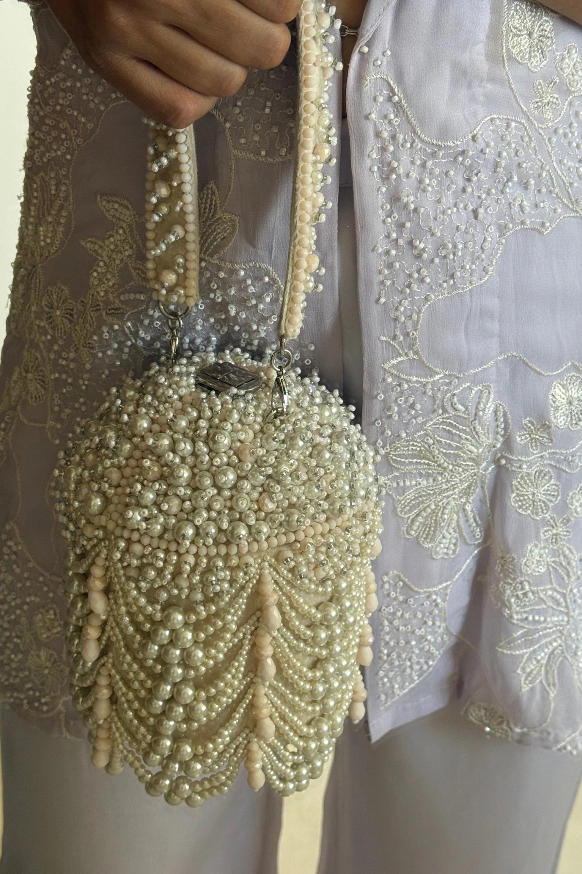 Luxury pearl bag for women with elegant layered detailing