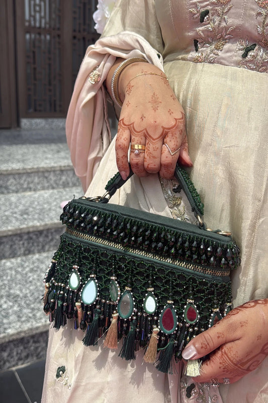 Green mehendi vanity bag for women with handcrafted detailing