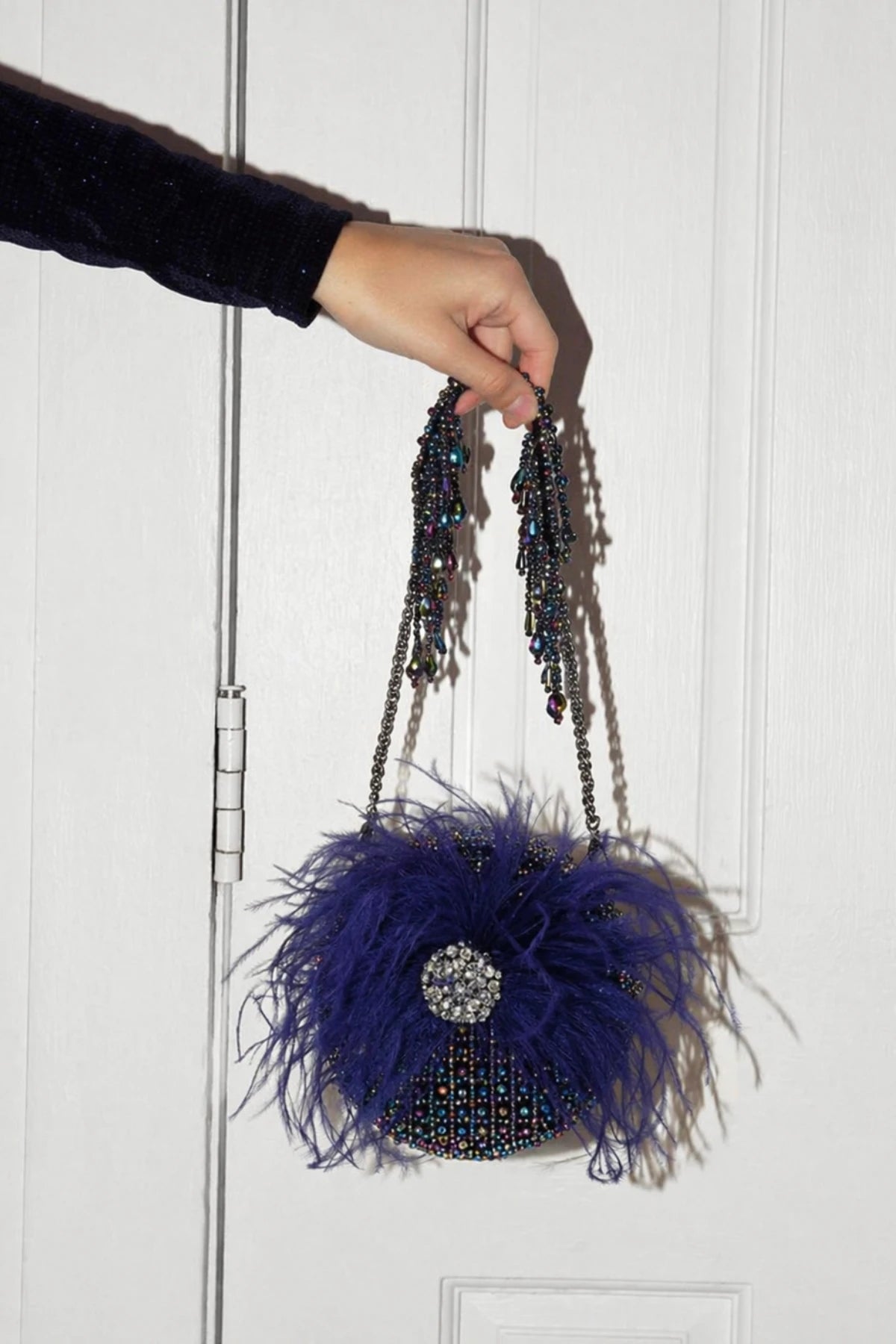 Multi colour round bag for women with statement detailing