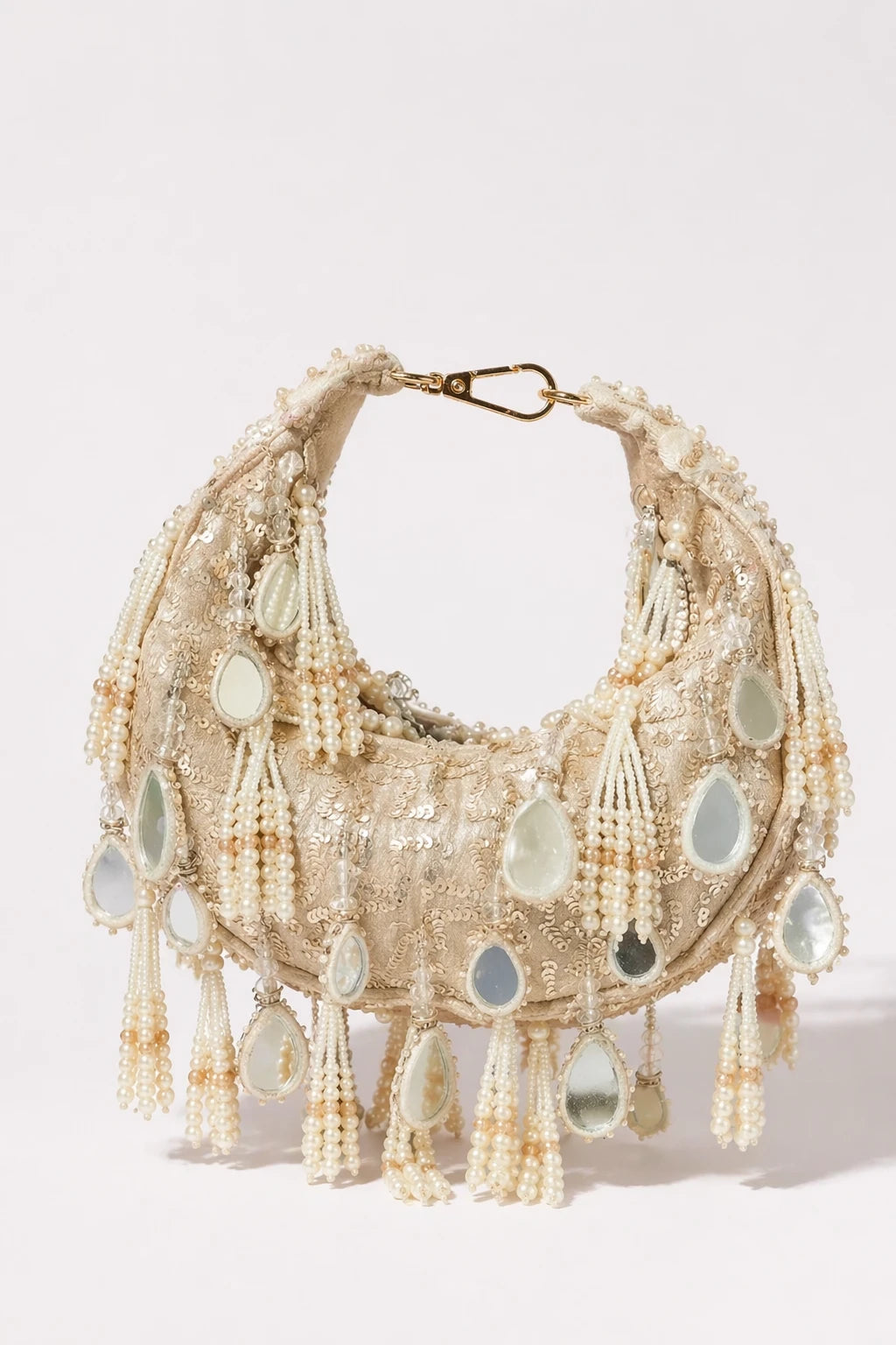 Nayab Festive Hobo Bag with handcrafted mirror work and pearl tassels