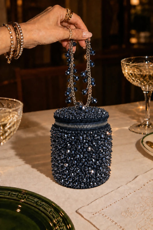 Nero Charcoal Blue Bag featuring shimmering blue bead embellishments and a cylindrical silhouette, perfect for parties.