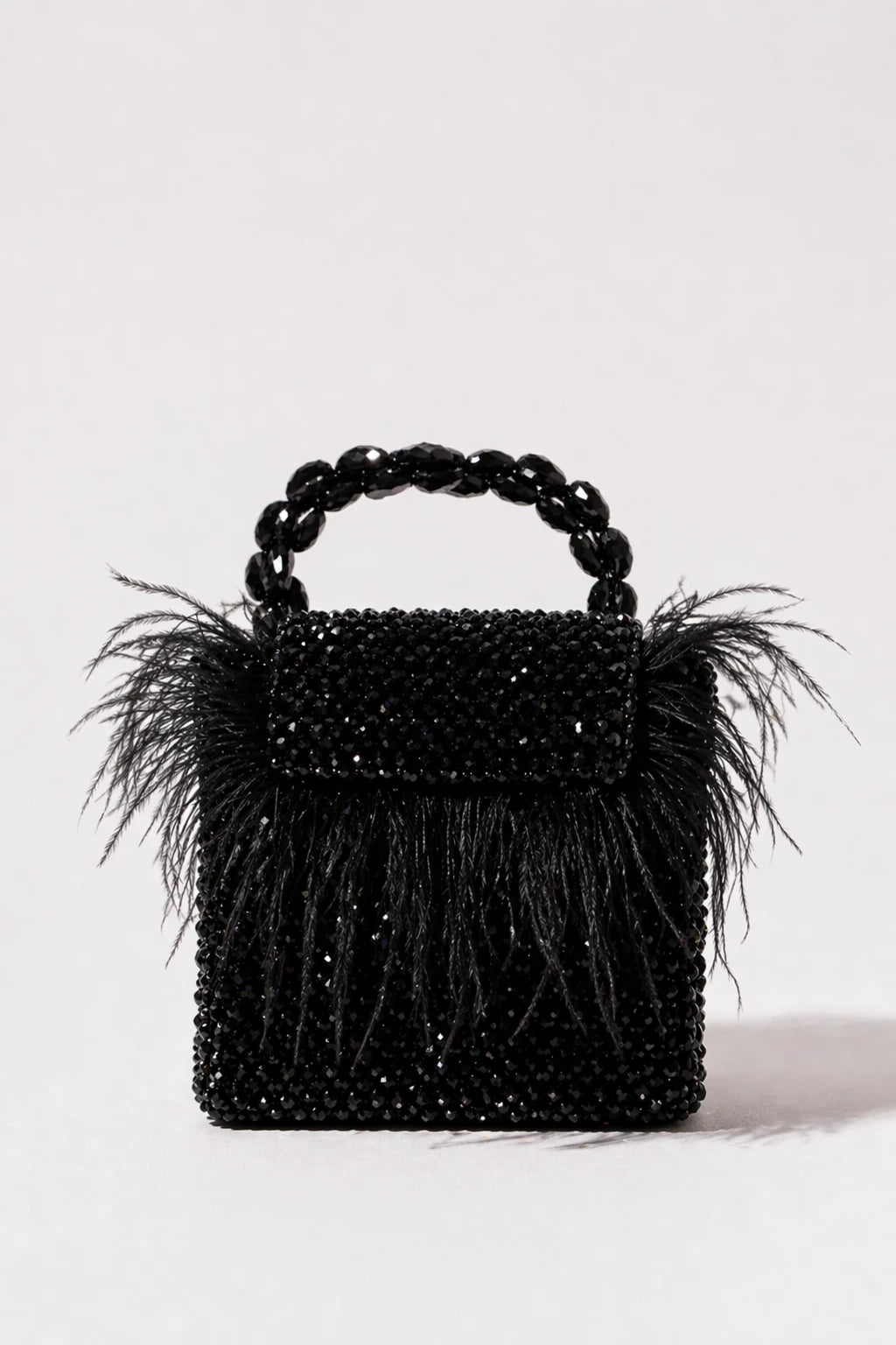 Peacock Black Mini Bag with handcrafted feather embellishments