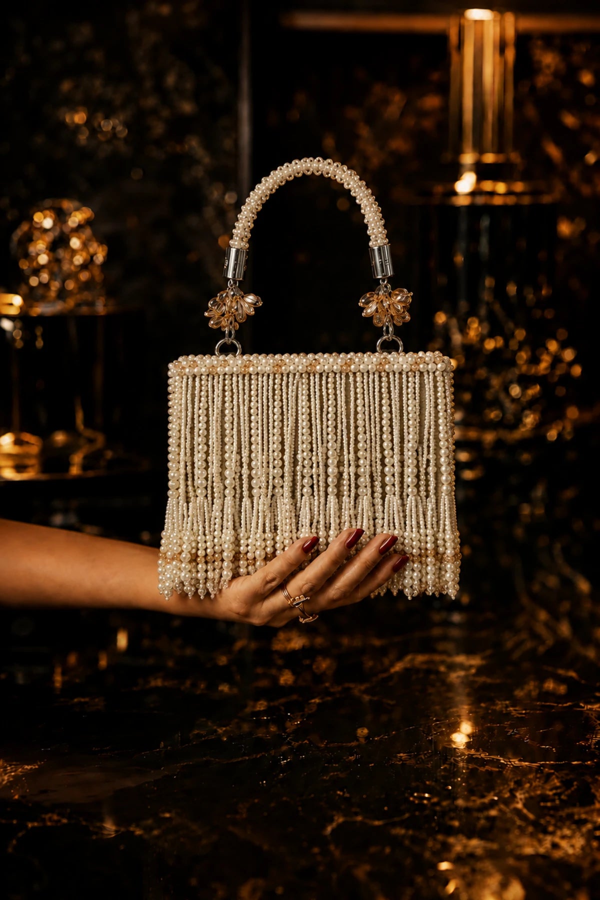 Pearl embellished mini bag paired with a saree for Haldi celebrations