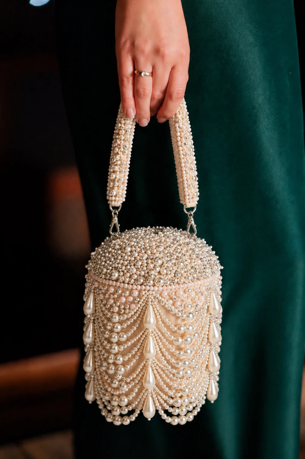 Pearl embellished bucket bag with handcrafted bead detailing