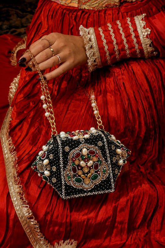 Bridal potli bag with gold chain strap and pearl detailing