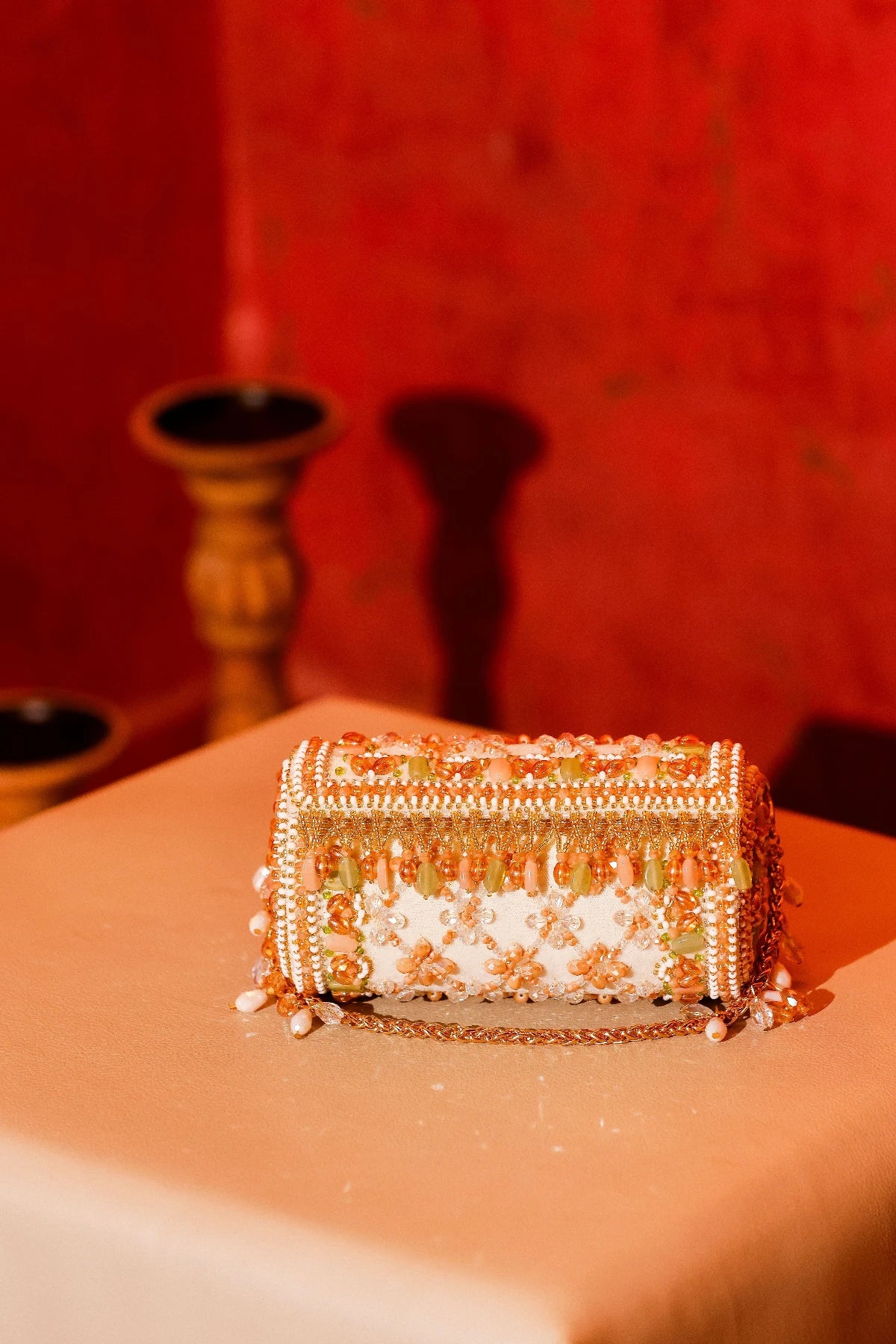 Premium festive handbag for women with pearl and bead detailing
