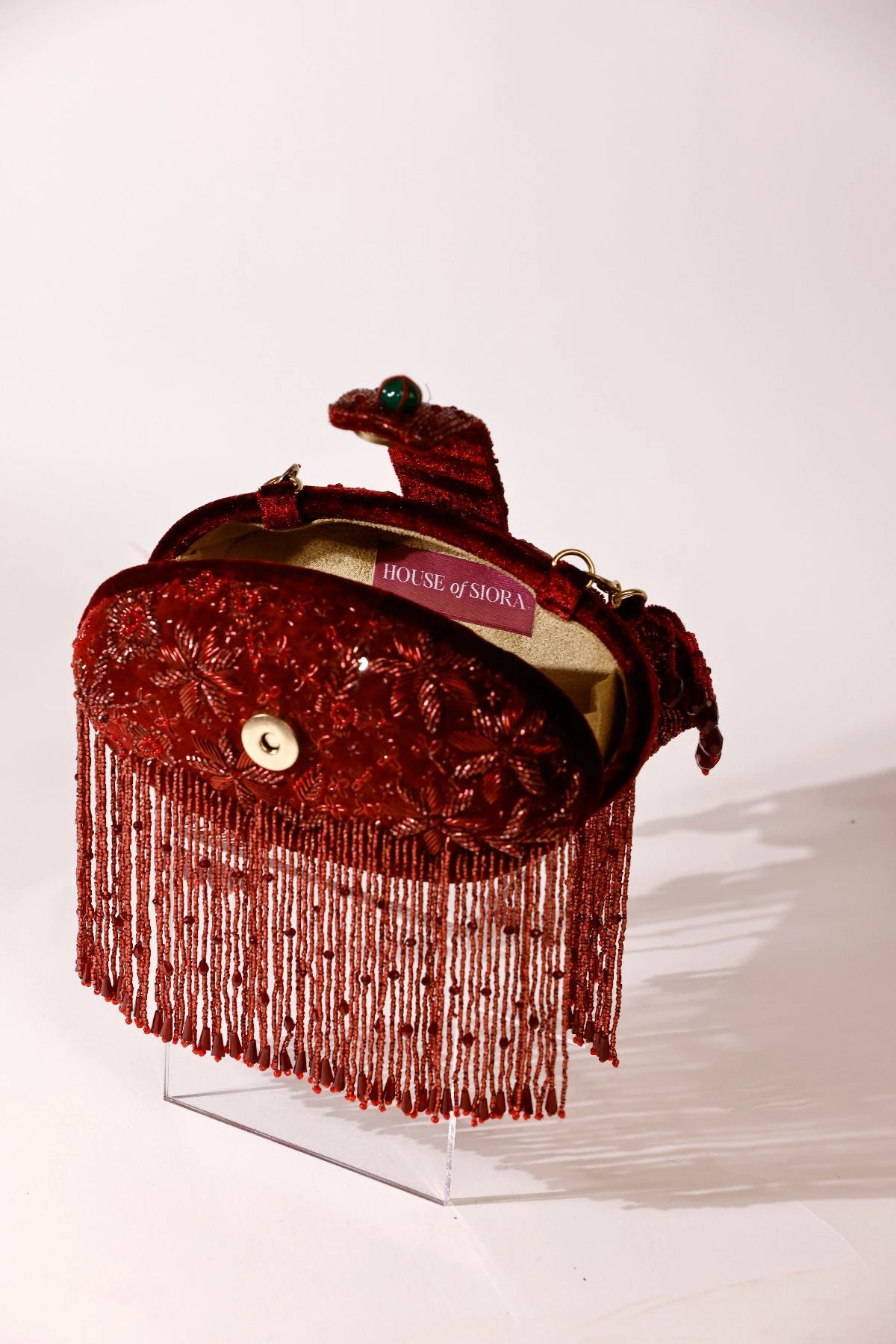 Red clutch bag for sangeet ceremonies and wedding celebrations