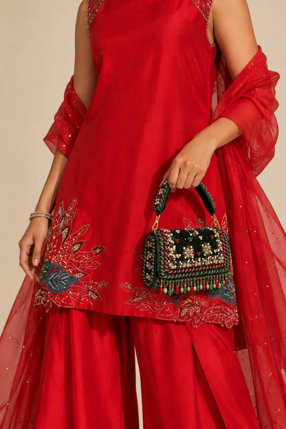 Regal Green Big Bag featuring intricate red, gold and pearl-toned embellishments on a deep green base, perfect for weddings and receptions.