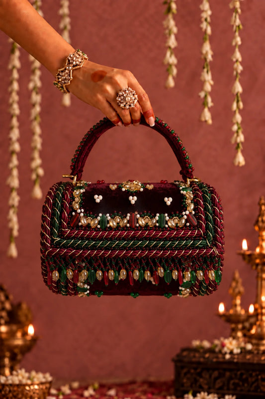 Regal Red Jumbo Clutch featuring intricate red, green and gold beadwork with pearl embellishments, perfect for weddings and receptions.