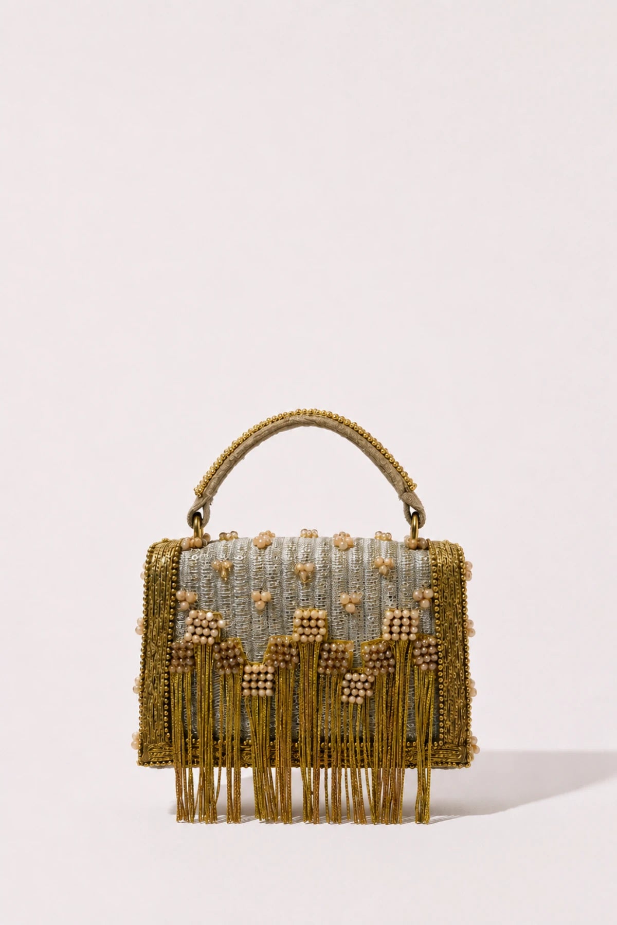 Reva Mini Bag with handcrafted floral beadwork and golden fringe