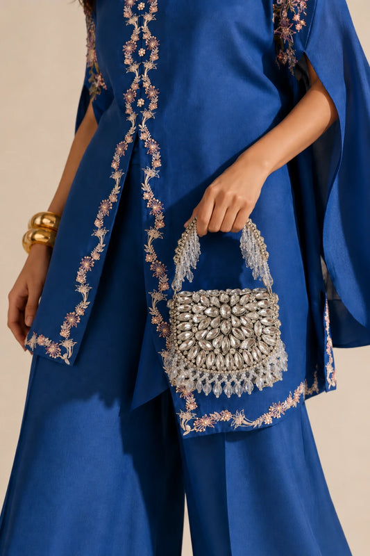 Roop Kundan Silver Mini Bag featuring intricate silver kundan-inspired stone embellishments and sparkling crystals for haldi celebrations.