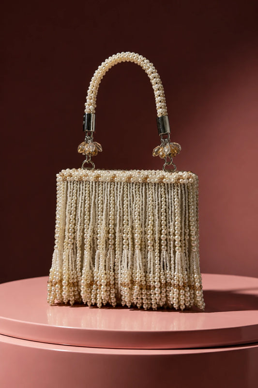 Ruh Pearl Mini Bag with handcrafted pearl embellishments and floral handle