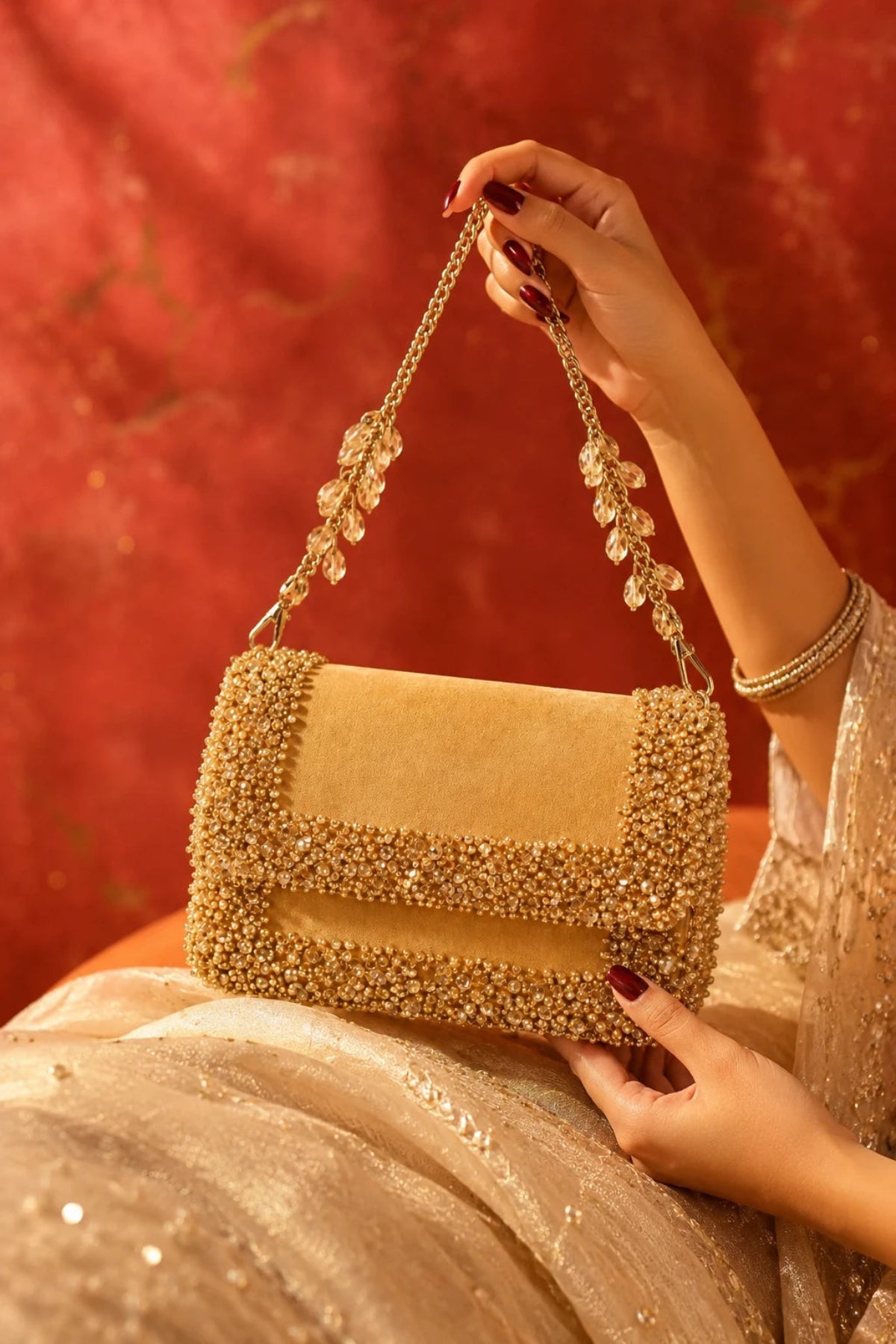 Golden shoulder bag for cocktail parties and evening events