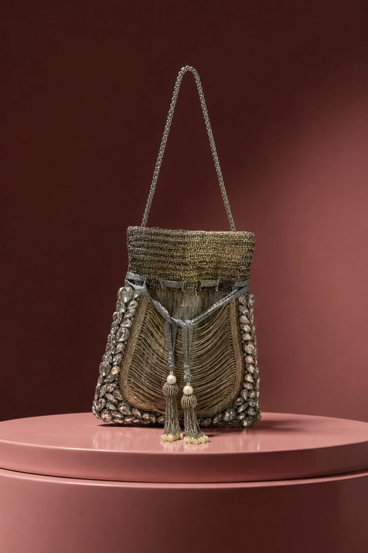Silver festive potli bag for women with cascading tassel detailing