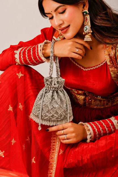Silver potli bag for haldi ceremonies and festive celebrations