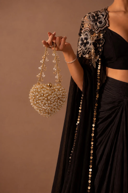 Stardust Golden & Silver Heart Bag featuring shimmering crystal bead embellishments, perfect for sangeet and cocktail parties.