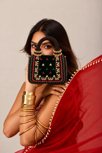 Statement bag for women with ornate beadwork and floral motifs