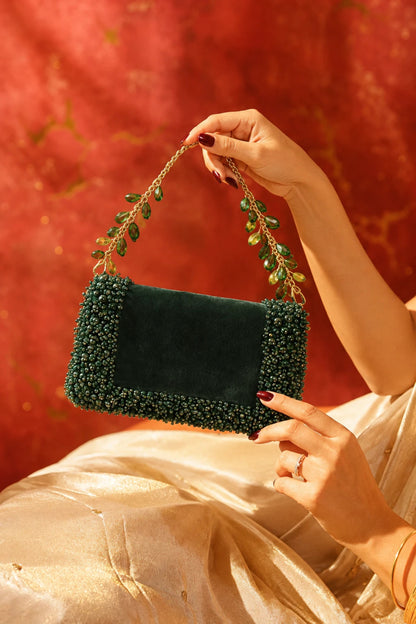 Statement green shoulder bag with handcrafted detailing