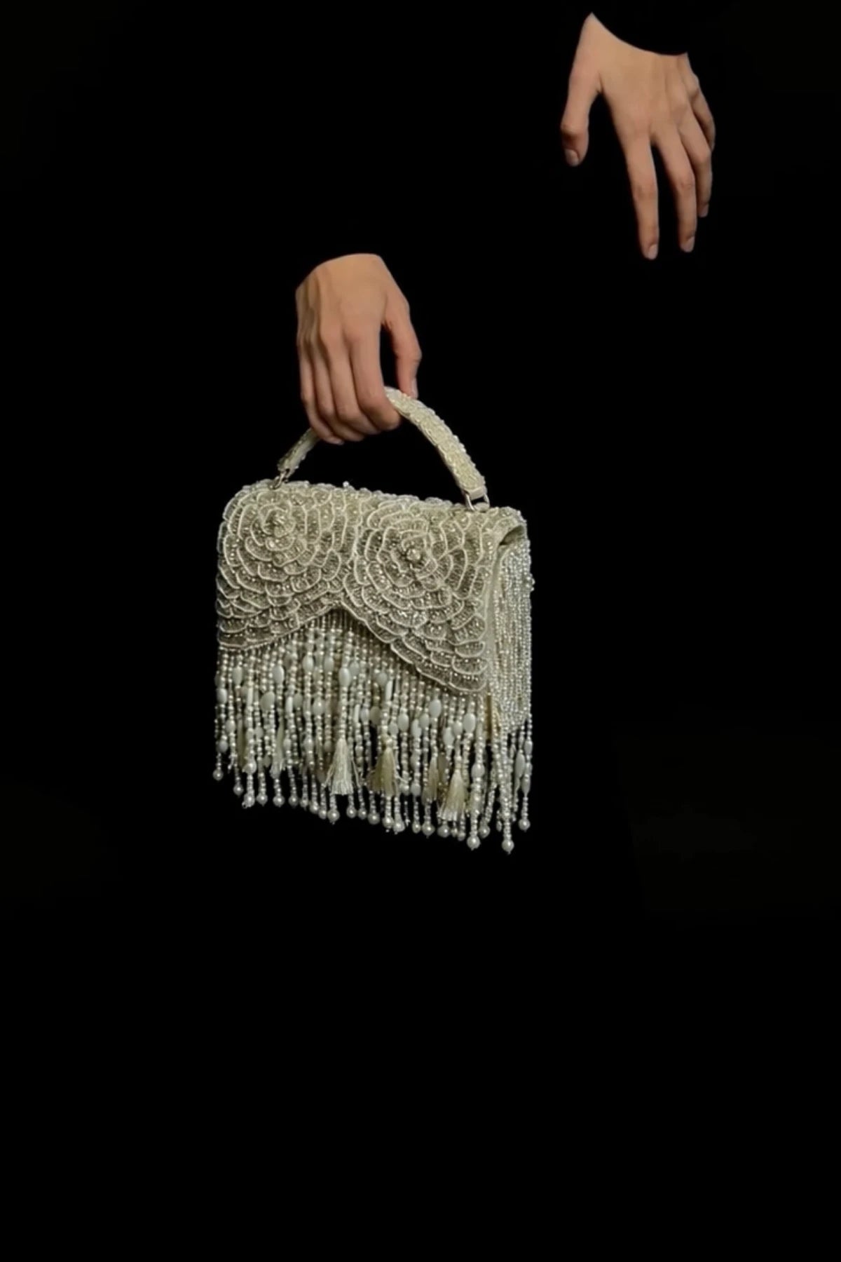Statement silver clutch bag with detachable chain