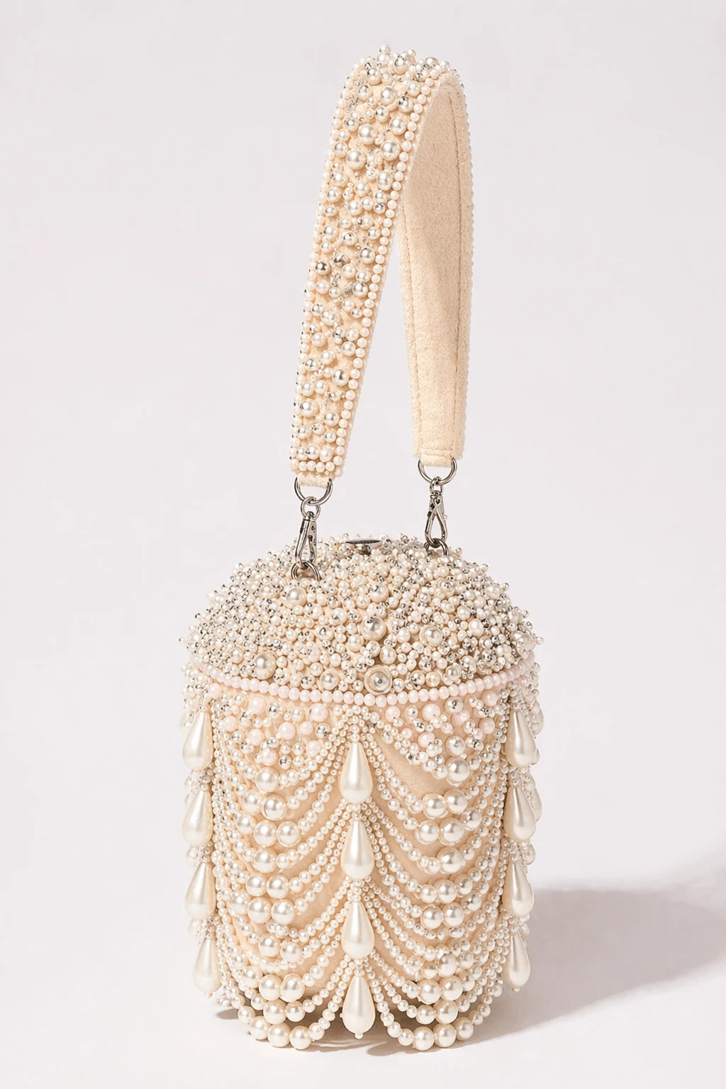 Symphony Pearl Bucket Bag with cascading pearl embellishments