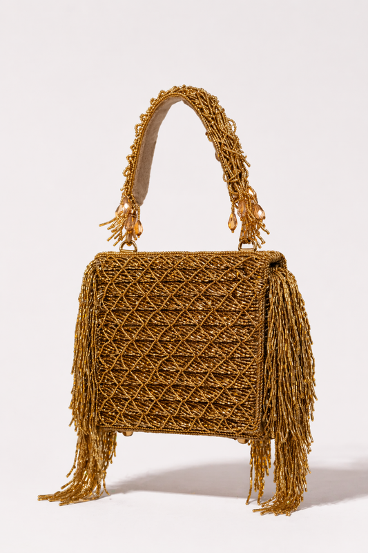 Wedding clutch for women featuring handwoven gold detailing