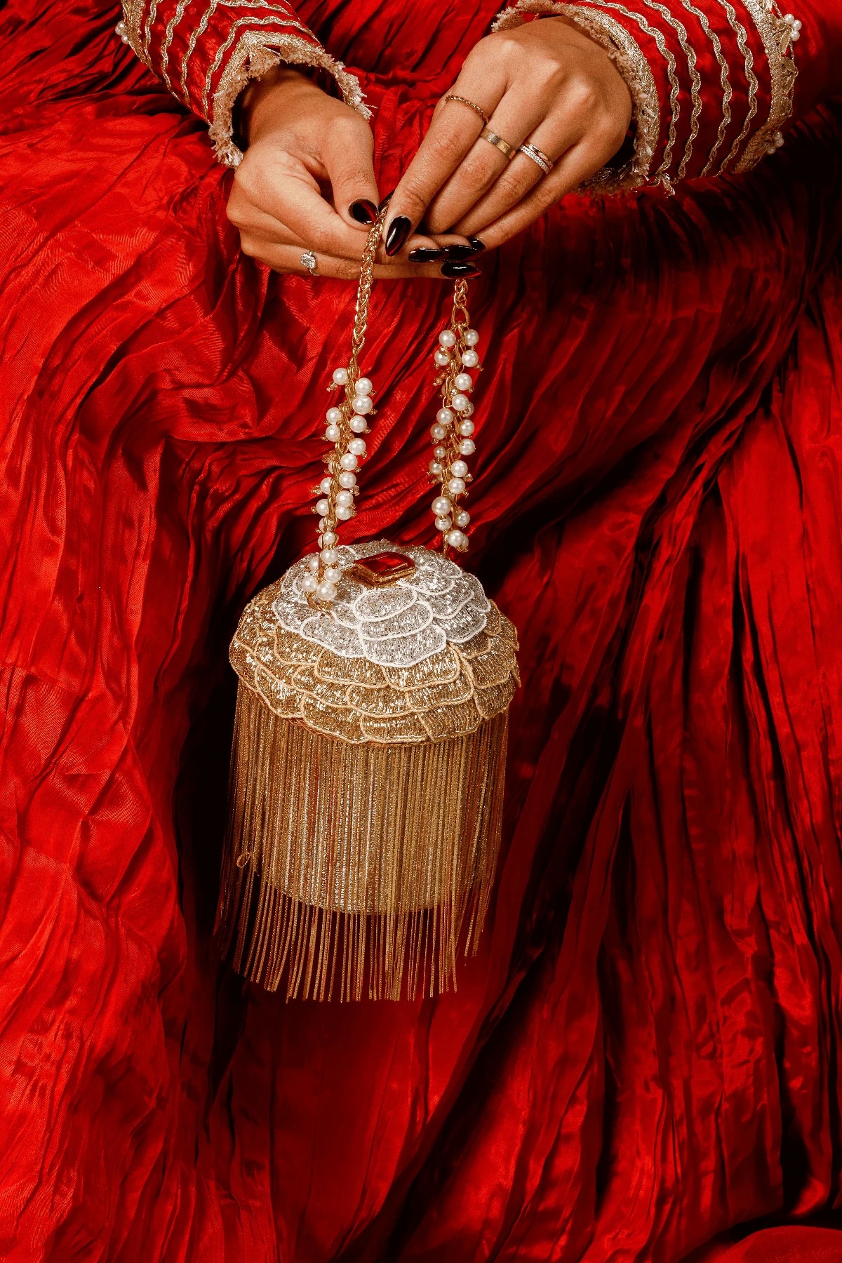 Wedding guest bucket bag with metallic fringe detailing