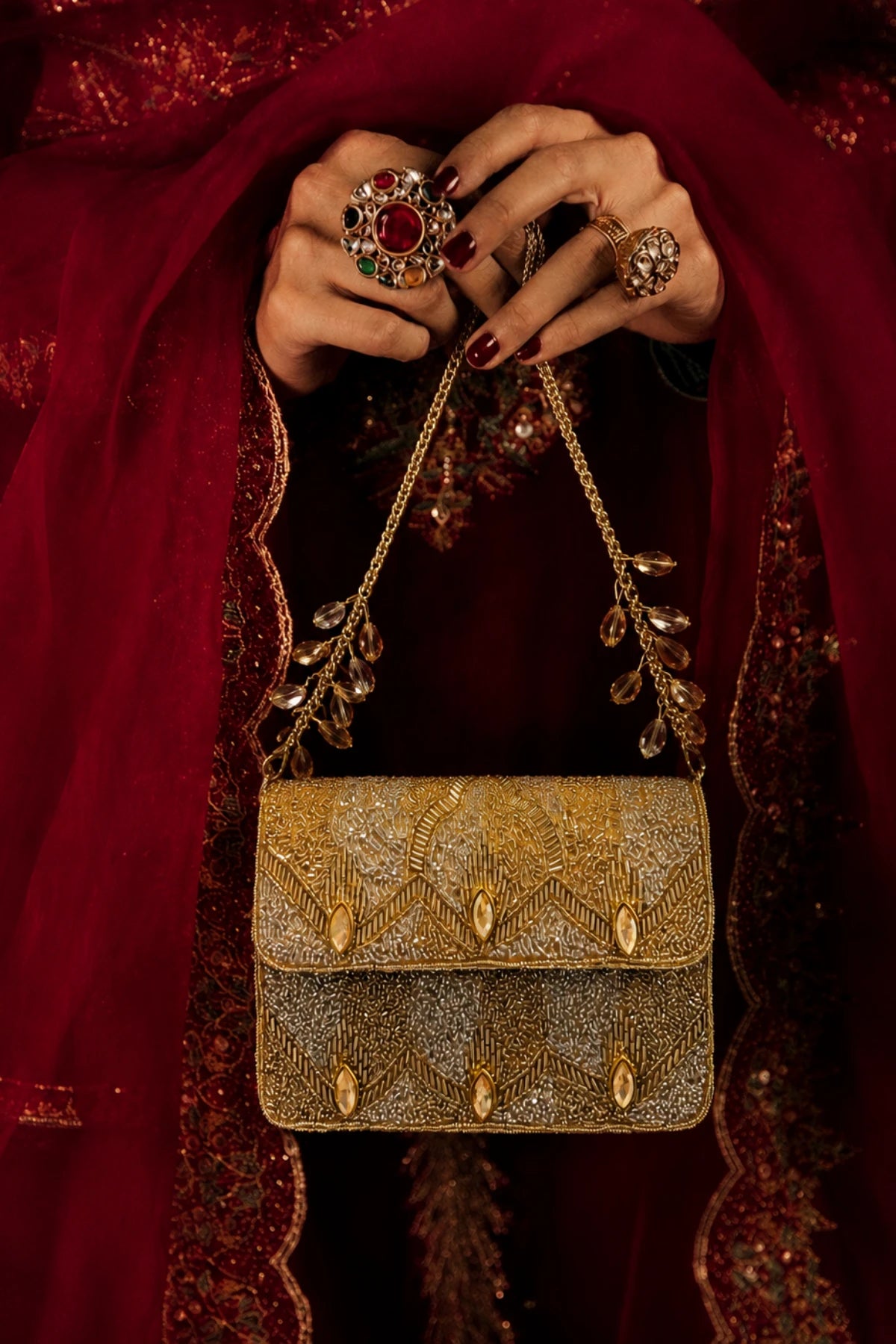 Golden shoulder bag with intricate zari-inspired beadwork